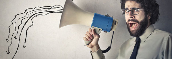 Person holding their throat, indicating hoarseness